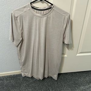 Cream colored polyester T-shirt